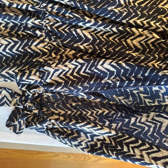 One piece jumpsuit.  Fits like a small medium. - Picture 6 of 8